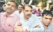  ??  ?? CBI officer Devender Kumar (C), who was arrested on Monday, being produced in Patiala House court on Tuesday. SONU MEHTA/HT