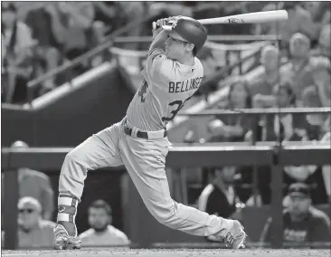  ?? File, Rick Scuteri / AP ?? NL Rookie of the Year Cody Bellinger of Los Angeles shows off his home run style during the NLDS.