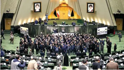  ?? Picture: AFP ?? BACKLASH. Iranian MPs chant ‘death to America’ while raising clenched fists during a meeting in the capital, Tehran.