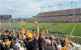  ?? AARON LYNETT THE CANADIAN PRESS FILE PHOTO ?? You’re likely to be seeing many more fans watching the game, and listening to it on their cellphones, if indicators broadcasti­ng from Tiger-Cats management prove true, writes Steve Milton.