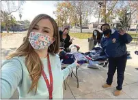  ?? PROVIDED PHOTO ?? East Bakersfiel­d High School social worker Natasha Martinez started the Blade Closet as a way to help students and families who need basic hygienic supplies. Martinez, left, hosted a dropoff event for donations before Christmas.