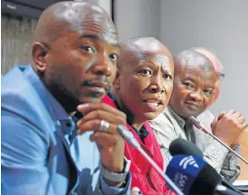  ?? /AFP (See Page 3) ?? Opposition: DA leader Mmusi Maimane, left, EFF leader Julius Malema, United Democratic Movement leader Bantu Holomisa and Corne Mulder of the Freedom Front Plus, at a media conference on Monday explaining their position on President Jacob Zuma’s future.