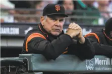  ?? Gabrielle Lurie / The Chronicle ?? After losing some mainstays of his coaching staff, manager Bruce Bochy apparently will have to change his approach.