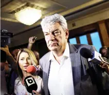  ??  ?? Mihai Tudose, Romania’s ruling Social Democrats pick to replace the prime minister they ousted last week, talks with media in Bucharest on Monday. (Reuters)