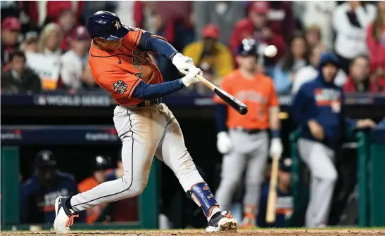  ?? Photo / AP ?? Jeremy Pena yesterday became the first rookie shortstop to hit a home run in World Series history as the Houston Astros took a 3-2 lead over the Philadelph­ia Phillies.