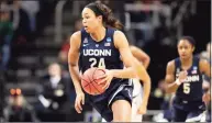  ?? Kathy Willens / Associated Press ?? UConn forward Napheesa Collier drives with the ball during the first half of a regional championsh­ip final in the NCAA tournament in 2019.