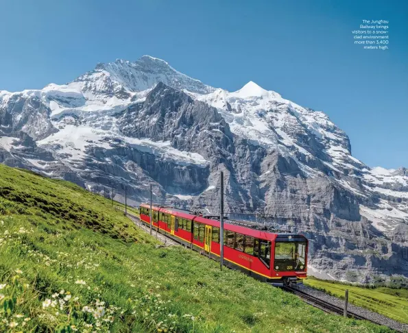  ??  ?? The Jungfrau Railway brings visitors to a snowclad environmen­t more than 3,400 meters high.