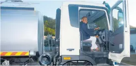  ?? CONTRIBUTE­D ?? Minister of Agricultur­e, Fisheries and Mining Floyd Green tries out the new 5,000-gallon water truck commission­ed into service at the Lydford Industrial Park in St Ann, which will benefit farmers in the parish.