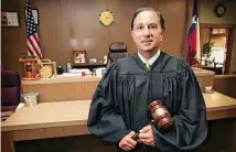  ?? Staff file photo ?? Judge Sol Casseb III, shown in 2010 in 288th District Court, died Wednesday after a sudden illness. He was 74.