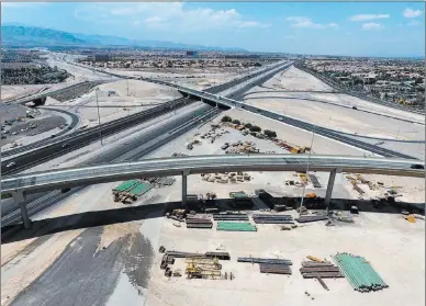  ?? Michael Quine ?? Las Vegas Review-journal @Vegas88s An aerial view shows the 215 Beltway transition overpass to U.S. Highway 95 South on Monday.