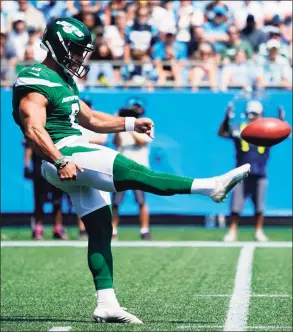  ?? Jacob Kupferman / Associated Press ?? New York Jets kicker Matt Ammendola punts against the Carolina Panthers on Sunday.