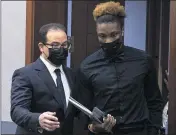  ?? BIZUAYEHU TESFAYE — LAS VEGAS REVIEW-JOURNAL VIA AP ?? Henry Ruggs, right, former Raiders wide receiver accused of DUI resulting in death, enters the courtroom with his attorney, Richard Schonfeld, at the Regional Justice Center.