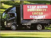  ?? Christian Abraham / Hearst Connecticu­t Media ?? A billboard truck rented by the organizer of Greenwich Patriots drives past a Board of Education meeting at Central Middle School in Greenwich in 2021.