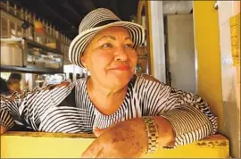  ??  ?? OWNER Carmen M. Davila Ramos reopened La Gozadera in August, 11 months after Hurricane Maria heavily damaged the dance hall and much of Yabucoa.