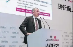  ?? PHOTOS PROVIDED TO CHINA DAILY ?? Left: Ming Cheng Chien, president of Lanxess Asia-Pacific, introduces the company’s operation and future strategy in China.