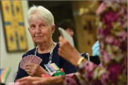  ?? BARRY GRAY, THE HAMILTON SPECTATOR ?? Olive Matthie waits for her opponent to play a card at the Hamilton Bridge Centre.