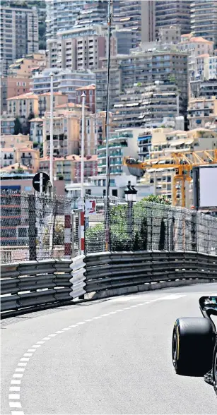  ?? ?? Bouncing: Mercedes’ Lewis Hamilton takes to the Monaco streets at practice yesterday