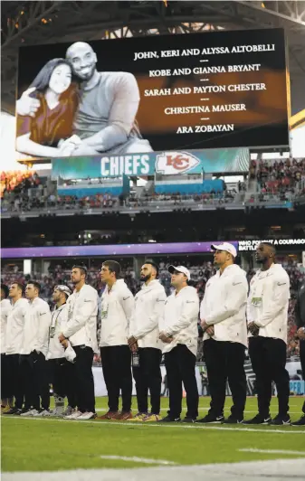  ?? Mark Humphrey / Associated Press ?? The 49ers’ players stand during a tribute to Kobe and Gianna Bryant and other crash victims.