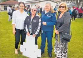  ?? LVN261018s­bshoebox3 ?? (L-R) Horowhenua District Council Community Developmen­t Advisor Sophie Parrant, Fill A Shoebox organiser Therase Apatu, coorganise­r Sgt Beth Purcell and Horowhenua College Head of Social Sciences Kathy Grey.