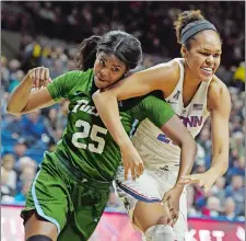  ?? SEAN D. ELLIOT/THE DAY ?? UConn’s Azura Stevens, right, was named Sixth Player of the Year and Newcomer of the Year on Friday by the American Athletic Conference. The 6-foot-6 junior was also a second team All-AAC pick.