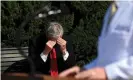  ?? Photograph: Erin Scott/Reuters ?? Meadows rubs his head as doctors speak about Trump’s health in Bethesda on 4 October.