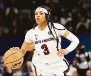  ?? Eric Gay / Associated Press ?? South Carolina’s Destanni Henderson scored 26 points in the Gamecocks’ win over UConn in the national championsh­ip game on Sunday.