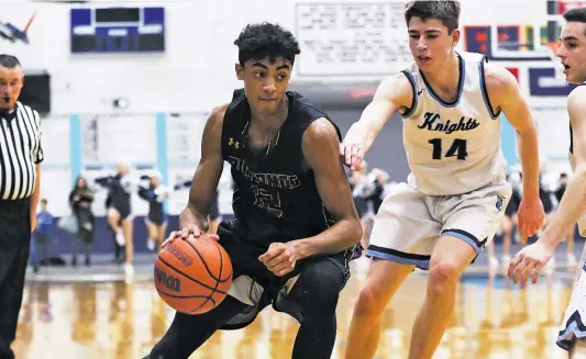  ?? ALLEN CUNNINGHAM/SUN-TIMES ?? Rolling Meadows’ Max Christie (above, left), who averaged 26 points and 10 rebounds this past season, is among the top 20 seniors-to-be in the nation.