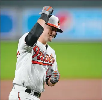  ?? NICK WASS/AP PHOTO ?? Baltimore’s Ryan Mountcastl­e rounds the bases after hitting a two-run home run during the sixth inning of the Orioles’ 4-2 win over the Red Sox on Tuesday night in Baltimore.