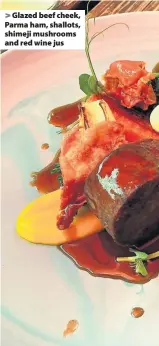  ??  ?? Glazed beef cheek, Parma ham, shallots, shimeji mushrooms and red wine jus