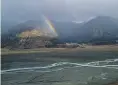  ?? ?? An approachin­g storm: A rainbow over the Tasman River and Ben Ohau Range.