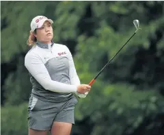  ?? AFP ?? Ariya Jutanugarn plays a shot during the Volvik Championsh­ip.