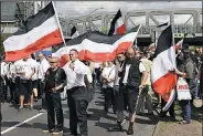  ?? AP/dpa/MAURIZIO GAMBARINI ?? Far-right extremists gather Saturday to commemorat­e the death of Adolf Hitler’s deputy Rudolf Hess in Berlin’s western district of Spandau.