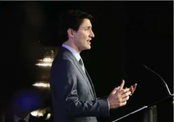  ?? SEAN KILPATRICK/THE CANADIAN PRESS ?? Trudeau says there would be a $150-billion boost to the economy if women were fully participan­t in the workforce.