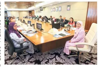  ??  ?? Thinking alike: Dr Wan Azizah chairing the National Council for Handicappe­d Persons Meeting in Putrajaya.