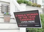  ?? BARBARA J. PERENIC/COLUMBUS DISPATCH ?? A sign promoting the Leukemia & Lymphoma Society’s Man & Woman of the Year campaign is displayed outside of the Bradley-krauss family home in Worthingto­n.