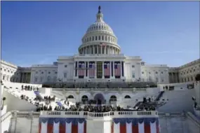  ?? PATRICK SEMANSKY — THE ASSOCIATED PRESS ?? The U.S. Capitol looms over a stage during a rehearsal of President-elect Donald Trump’s swearing-in ceremony, Sunday in Washington.