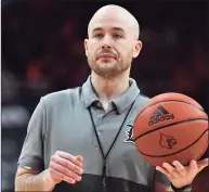  ?? Timothy D. Easley / Associated Press ?? Former Louisville assistant coach Luke Murray has been hired by UConn.