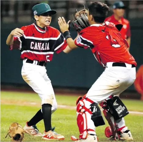  ?? TOM E. PUSKAR/THE ASSOCIATED PRESS ?? Pitcher Nate Colina celebrates with catcher Andre Juco after the Whalley Allstars escaped a bases-loaded jam in the sixth inning to triumph 6-4 over Mexico in an eliminatio­n game at the Little League World Series tournament on Monday.