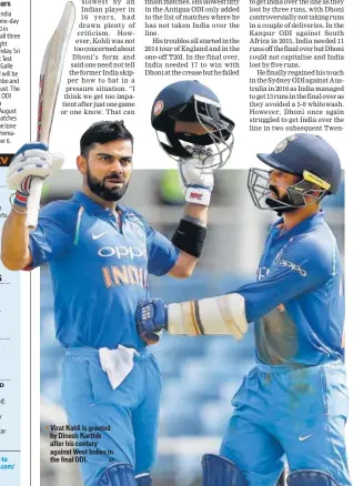  ?? AP ?? Virat Kohli is greeted by Dinesh Karthik after his century against West Indies in the final ODI.