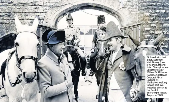  ??  ?? Pictured with their aides, Sergeant Mick Blakey (rear left) and Corporal John Champion, are Sergeant-Major William Griffiths as Napoleon (left) and Corporal Alick Ruddick as Wellington, waiting to take part in a Waterloo sketch at the Cardiff Searchligh­t Tattoo, August 4, 1973