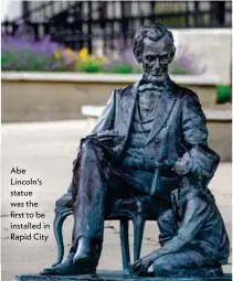  ??  ?? Abe Lincoln’s statue was the first to be installed in Rapid City