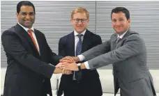  ?? Mubadala Petroleum ?? Mubadala Petroleum CEO Bakheet Al Katheeri with Gazprom Neft deputy CEO Vadim Yakovle, centre, and RDIF deputy CEO Anatoly Braverman