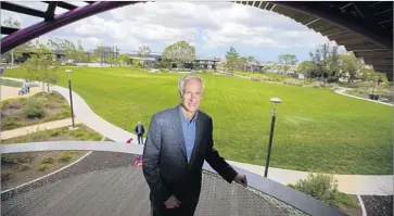  ?? Allen J. Schaben Los Angeles Times ?? JOHN BURNS, chief executive of John Burns Real Estate Consulting, at Beacon Park in Irvine. He says conversati­ons are key to his job. “I get out there talking to people and that’s when I learn what’s really going on.”