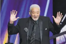  ?? Mark Duncan / Associated Press 2015 ?? Singersong­writer Bill Withers speaks in 2015 at the Rock and Roll Hall of Fame induction ceremony in Cleveland.