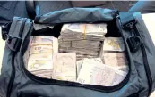  ??  ?? One of the bags of crooked cash recovered