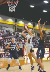  ?? The Sentinel-Record/James Leigh ?? INSIDE: Lady Wolves sophomore Aryn Hughes (24) puts up a shot on Nov. 17 at Wolf Arena during the Lake Hamilton Classic against Greenwood.