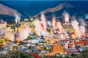  ??  ?? Steam rising up from thermal pools amid the city of Beppu.