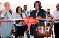  ??  ?? Ms. Freda Tamba, Director, Non-Bank Supervisio­n, Bank of Zambia and Elmo Jayetileke, Chief Executive Officer, Africa Region of LOLC, ceremonial­ly opening the first LOLC Finance Zambia Limited branch in Lusaka.