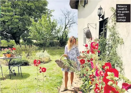  ??  ?? Rebecca Lovatt in the garden of her country cottage