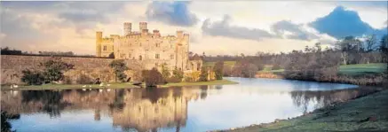  ?? Nick Brundle Photograph­y / Getty Images ?? LEEDS CASTLE, in Kent southeast of London, once housed six medieval queens and Henry VIII. Don’t miss the maze and gardens.